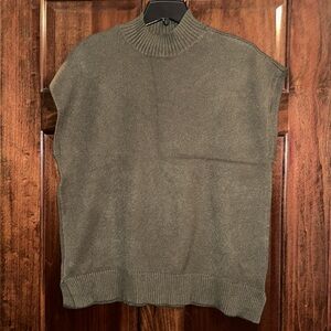 Cyrus women’s deep green sweater vest.